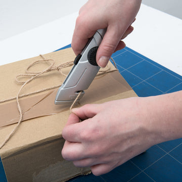CONNEX Unimesser Metall Automatik mit Trapezklinge, Zinkdruckguss-Griff