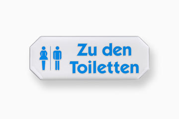 CONMETALL Hinweisschild 3D „Zu den Toiletten“ (Karton mit 10 Stk.)